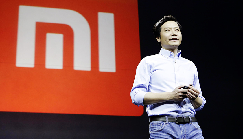Цена акций Xiaomi достигает рекордно высокого уровня, венчив генеральный директор Lei Jun в качестве самых богатых китайцев.